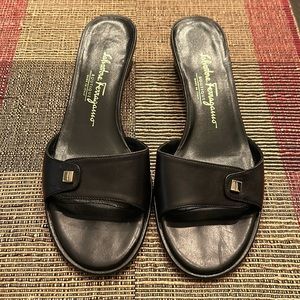 Salvatore Ferragamo women’s black slide dressy sandals.